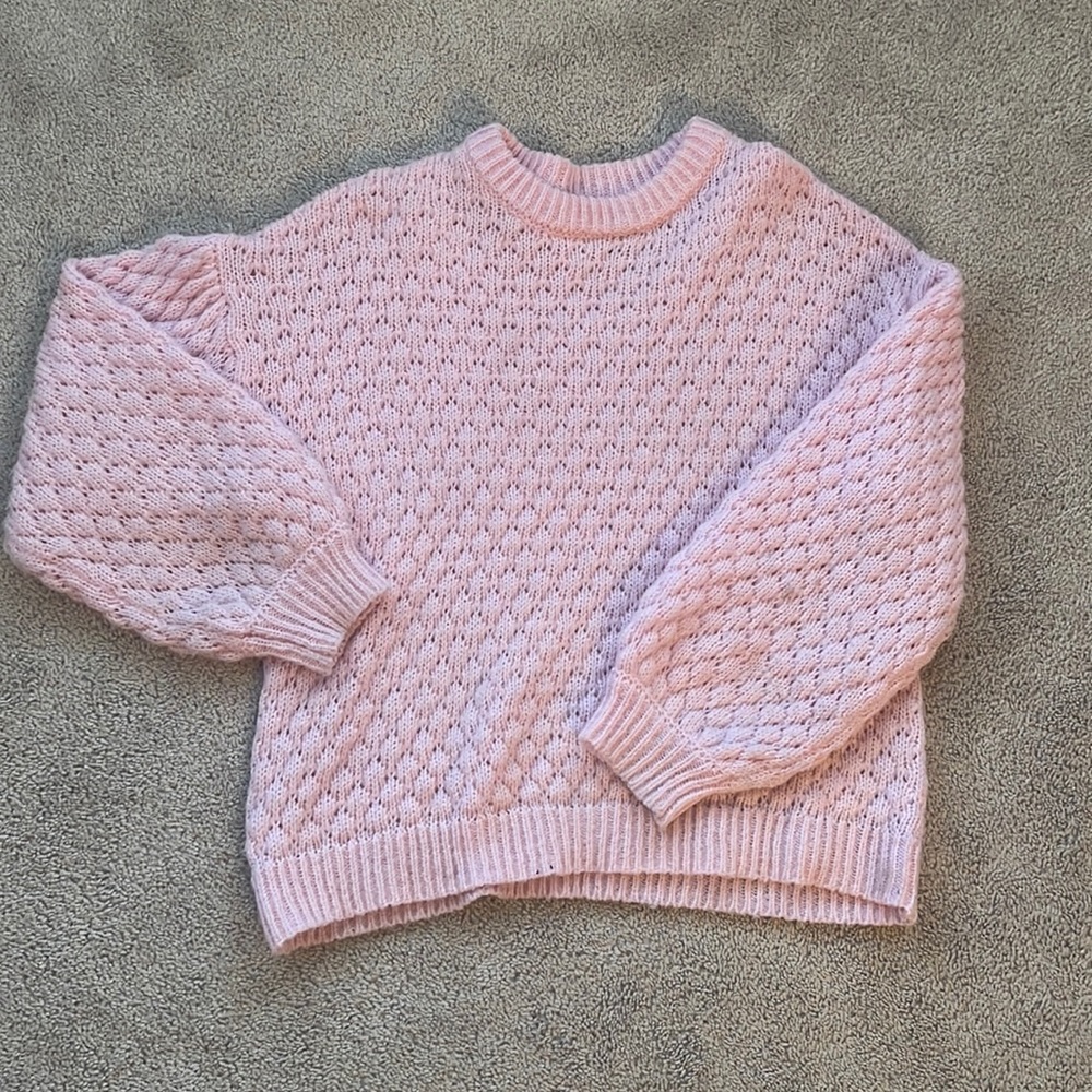 Soft pink knit sweater